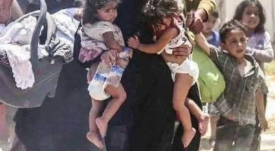 انتشار صورة لامرأة سورية نازحة مع أطفالها مع الادعاء أنها من قطاع غزة 