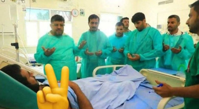 حقيقة صورة زيارة محمد علي الحوثي للغماري في المستشفى