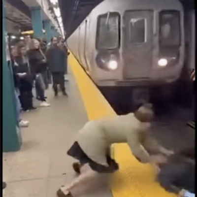 فيديو مُولّد بالذكاء الاصطناعي لسيدة تدفع شاب نحو سكة القطار